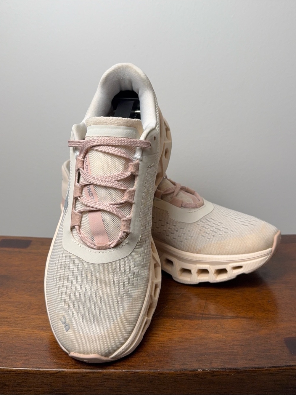 On Running Cloudmonster women’s running shoes in the Moon / Fawn colorway, featu